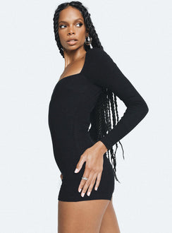 Black long sleeve playsuit Ribbed material Square neckline Invisible zip fastening at back Good stretch