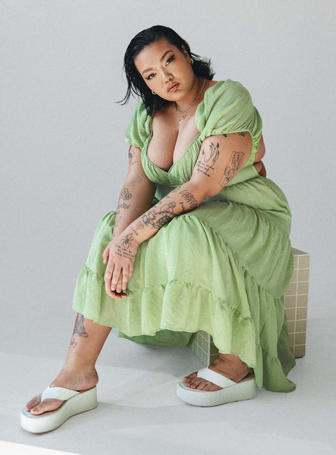 Front view of model wearing  front Princess Polly Asymmetric Neckline  Danny Midi Dress Green Curve