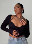 Front view of model wearing  front Princess Polly Full Sleeves Square Neck  Galyn Long Sleeve Top Black