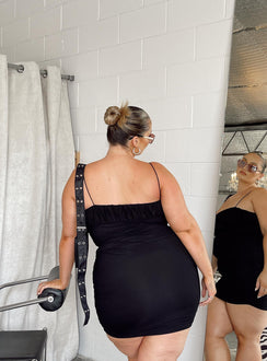 back view of model wearing Princess Polly Penney Mini Dress Black Curve 