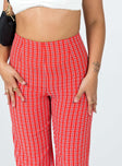 front view of model wearing Princess Polly Euros Pants Red Tartan 