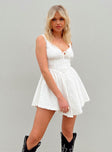 Front view of model wearing  front Princess Polly Crew Neck  Scarlett Mini Dress White