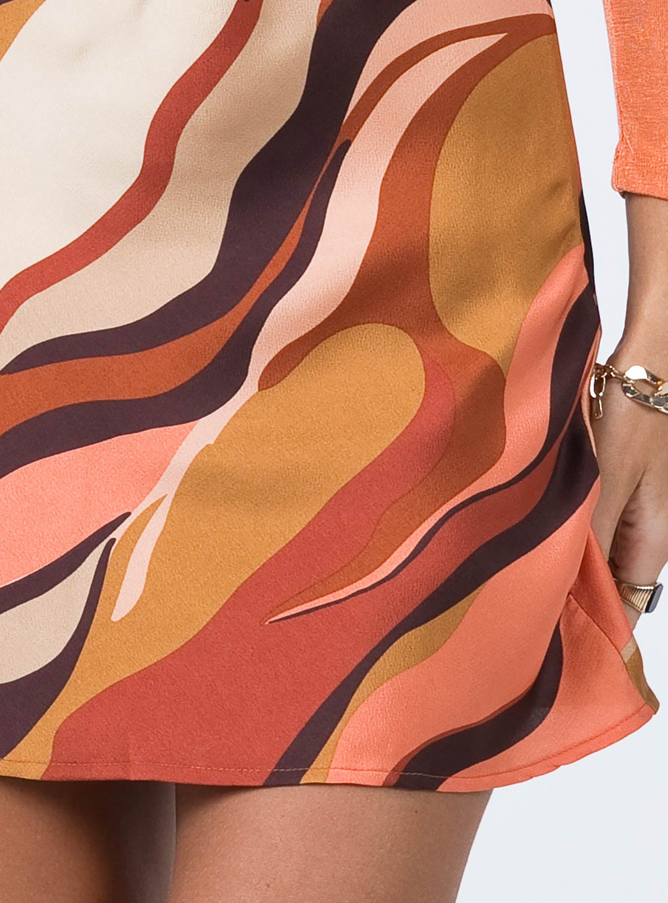 back view of model wearing Princess Polly Desert Storm Mini Skirt Orange 