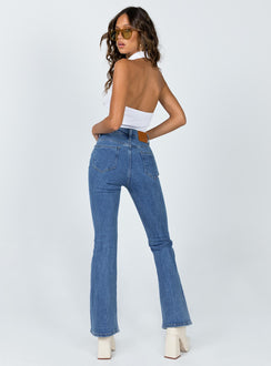 back view of model wearing Princess Polly Dark Wash Flare Jean Denim High Waisted 