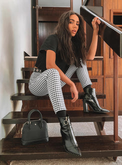 front view of model wearing Princess Polly Iggy Gingham Pants Black/White 