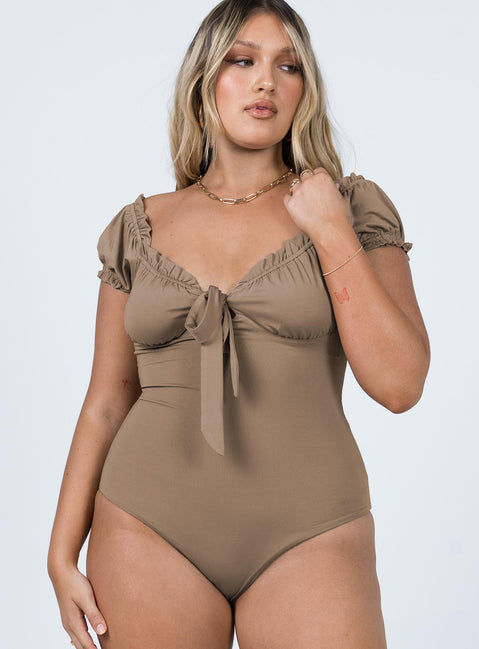 front view of model wearing Princess Polly Medina Bodysuit Brown Short Sleeves Plunger 