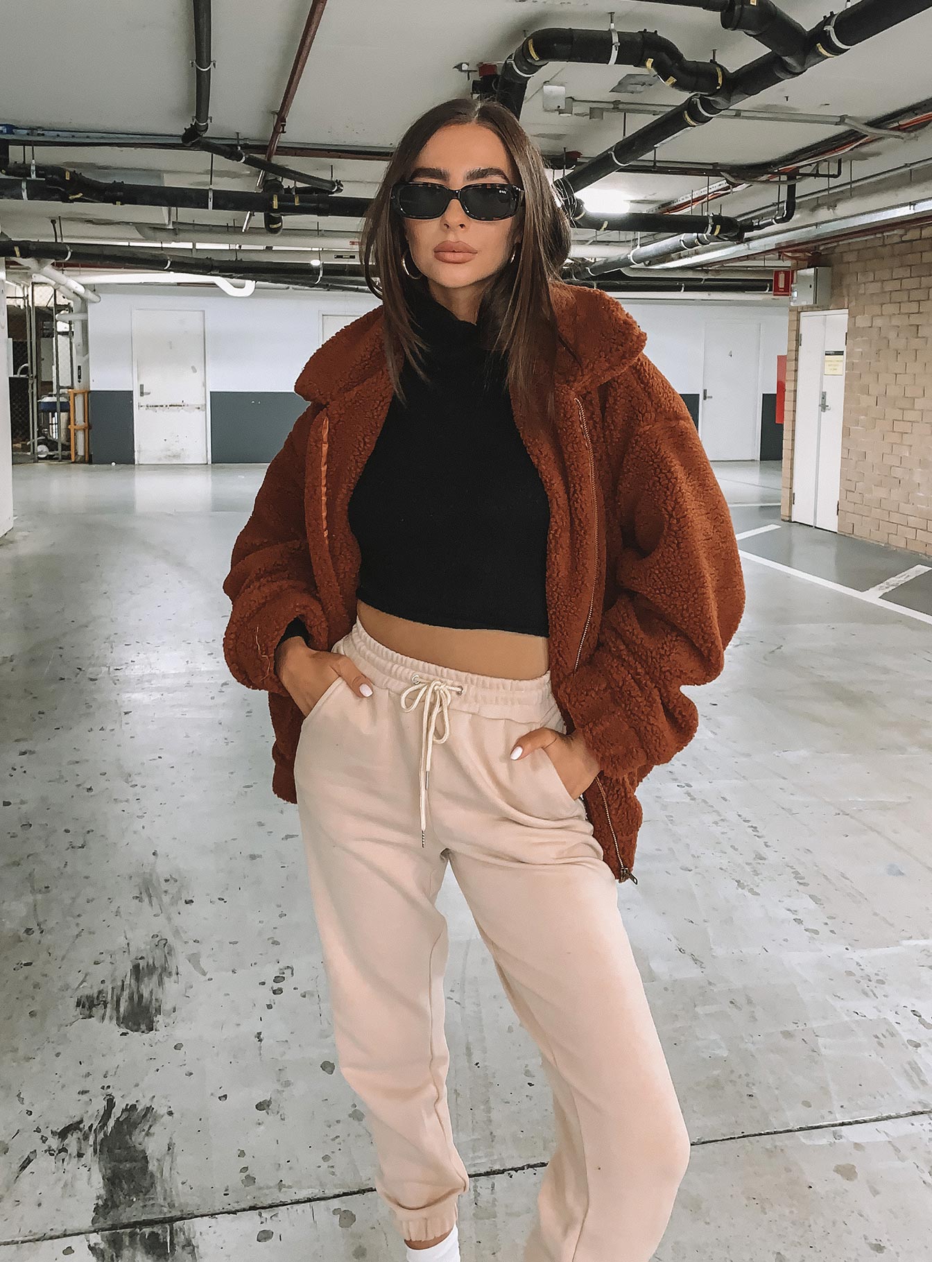 front view of model wearing Princess Polly Nero Sweat Pants Beige 