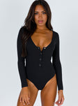 side view of model wearing Princess Polly Barlise Bodysuit Black Full Sleeves V-Neck 