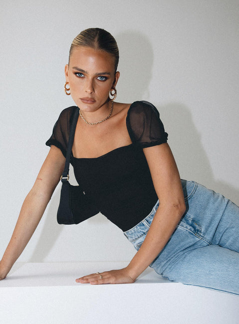 front view of model wearing Princess Polly Dostan Bodysuit Black Short Sleeves 