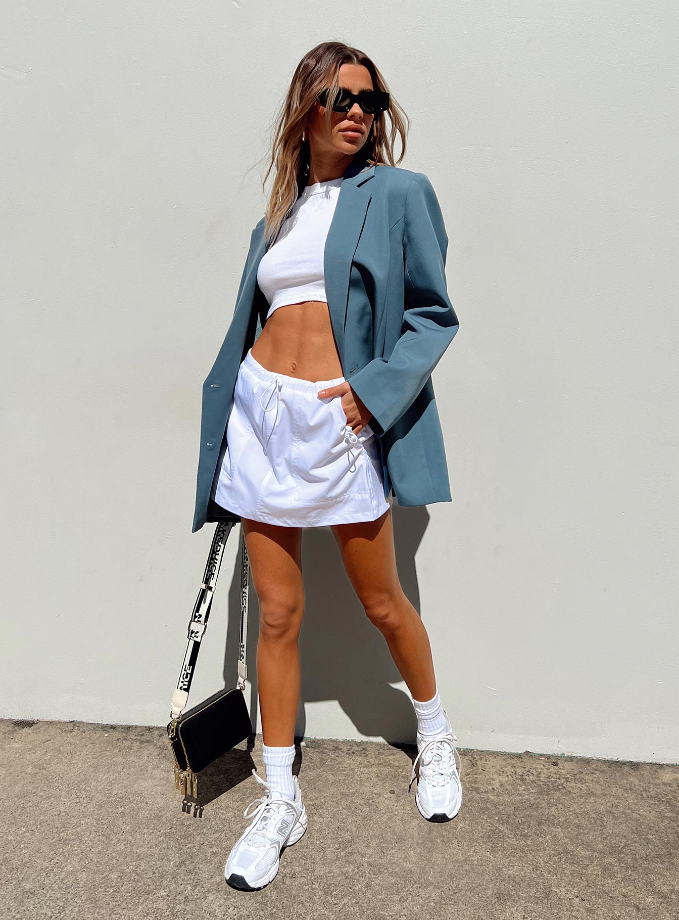 Oversized blazer in slate grey Double button fastening Twin front pockets Padded shoulders Lapel collar Split at back