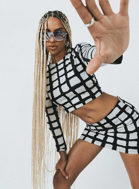 side view of model wearing Princess Polly Motel Bonnie Top Mesh Mono Painted Check Full Sleeves Crew Neck 