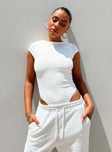 front view of model wearing Princess Polly Solita Bodysuit White Short Sleeves Boat Neck 