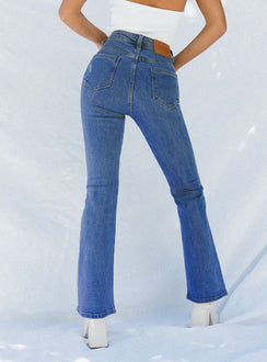 back view of model wearing Princess Polly Dark Wash Flare Jean Denim High Waisted 