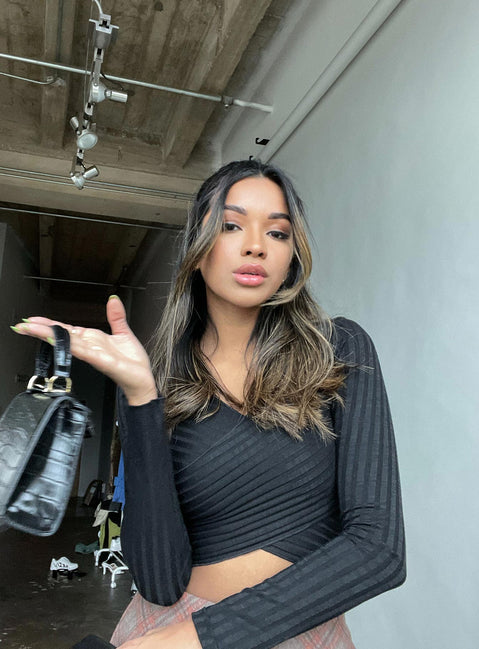 side view of model wearing Princess Polly Abigal Top 