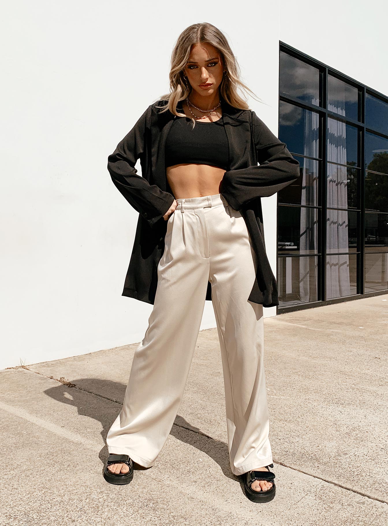 Front view of model wearing  front Princess Polly High Waisted Pants  Amalia Pants Beige