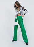 side view of model wearing Princess Polly Ashlea PU Pants Green 