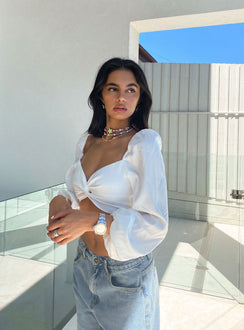 side view of model wearing Princess Polly Carson Long Sleeve Top White Lower Impact Full Sleeves Sweetheart 