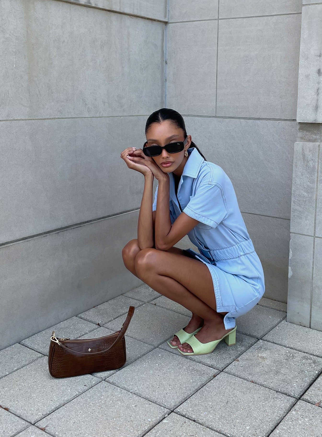 back view of model wearing Princess Polly Chateau Denim Mini Dress Light Wash 