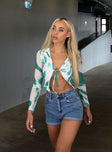 front view of model wearing Princess Polly Clyde Long Sleeve Top Green 