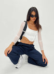 Front view of model wearing  front Princess Polly High Waisted Pants  Clydel Pants Navy