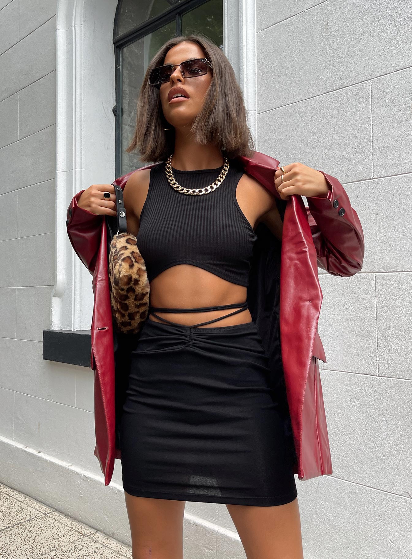   front view of model wearing Princess Polly Dom Mini Skirt Black 