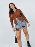 front view of model wearing Princess Polly Elody Long Sleeve Top Brown 