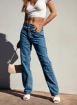 side view of model wearing Princess Polly Holly Asymmetric Straight Leg Jean Mid Wash Denim Mid Rise 