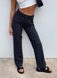 Front view of model wearing  front Princess Polly High Waisted Pants  Titius Pant Navy Tall