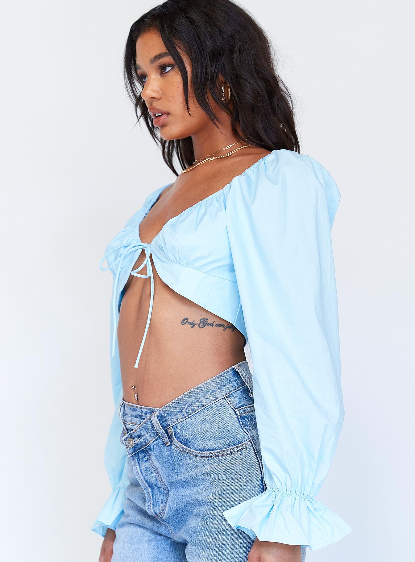 side view of model wearing Princess Polly Aldona Long Sleeve Top Blue 