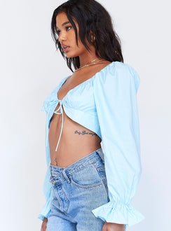 side view of model wearing Princess Polly Aldona Long Sleeve Top Blue 