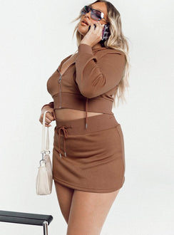   side view of model wearing Princess Polly Jaded Y2k Terry Mini Skirt Brown 