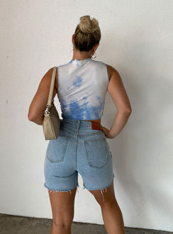 back view of model wearing Princess Polly Maggie Denim Shorts Denim High Waisted Shorts 