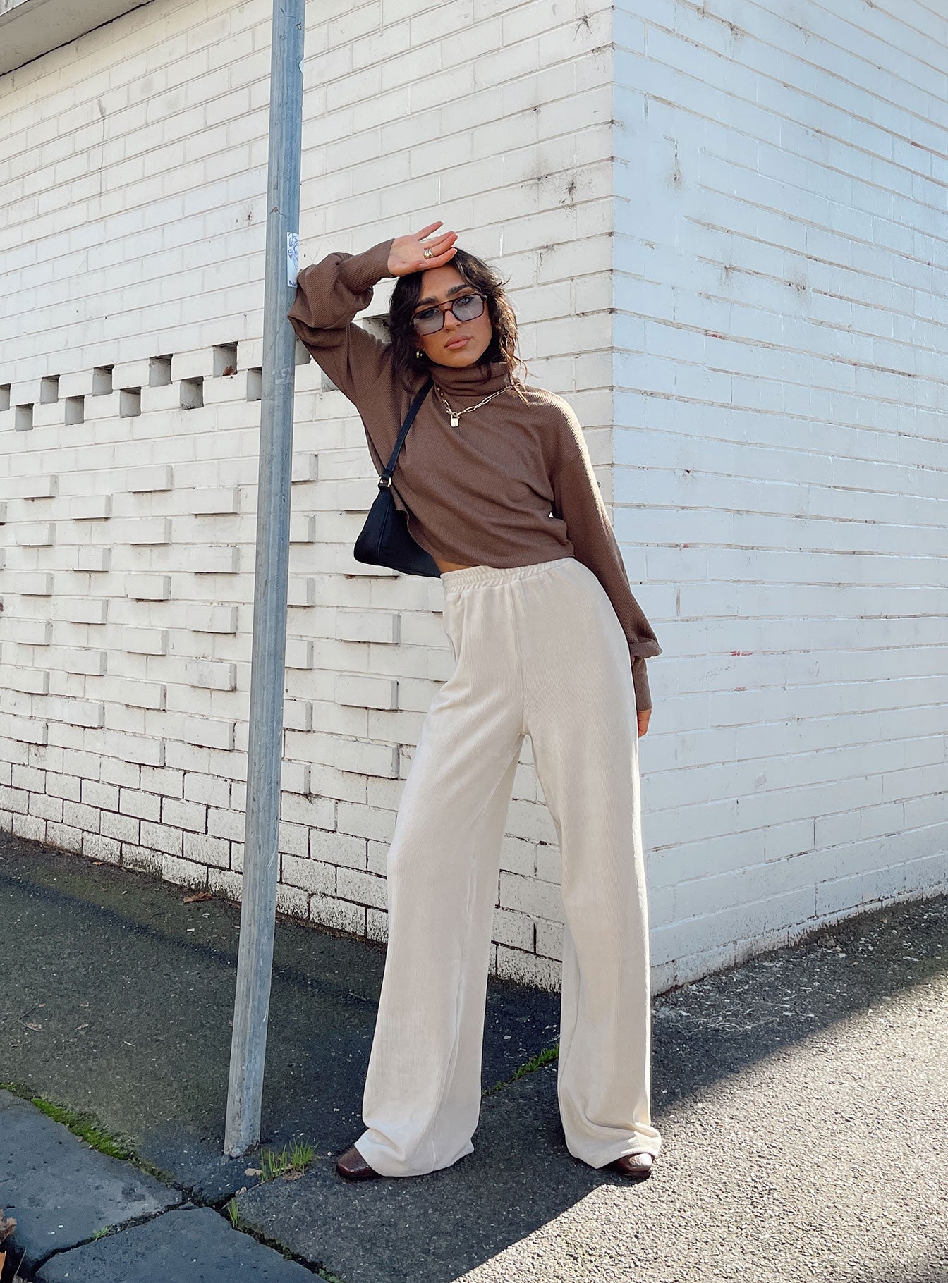 front view of model wearing Princess Polly Motel Obeli Trouser Rib Cream 