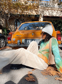 back view of model wearing Princess Polly Motel Obeli Trouser Rib Cream 