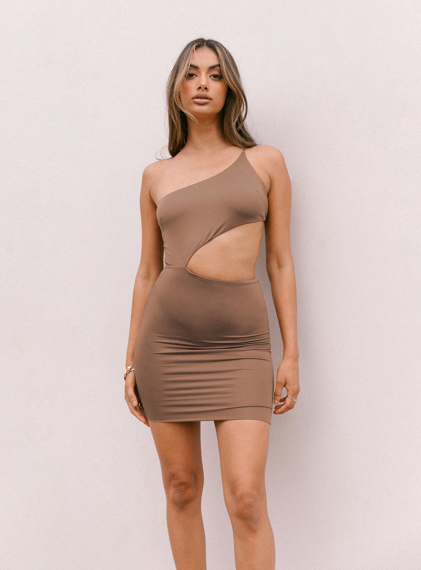 front view of model wearing Princess Polly Mia Asymmetrical Mini Dress Brown 