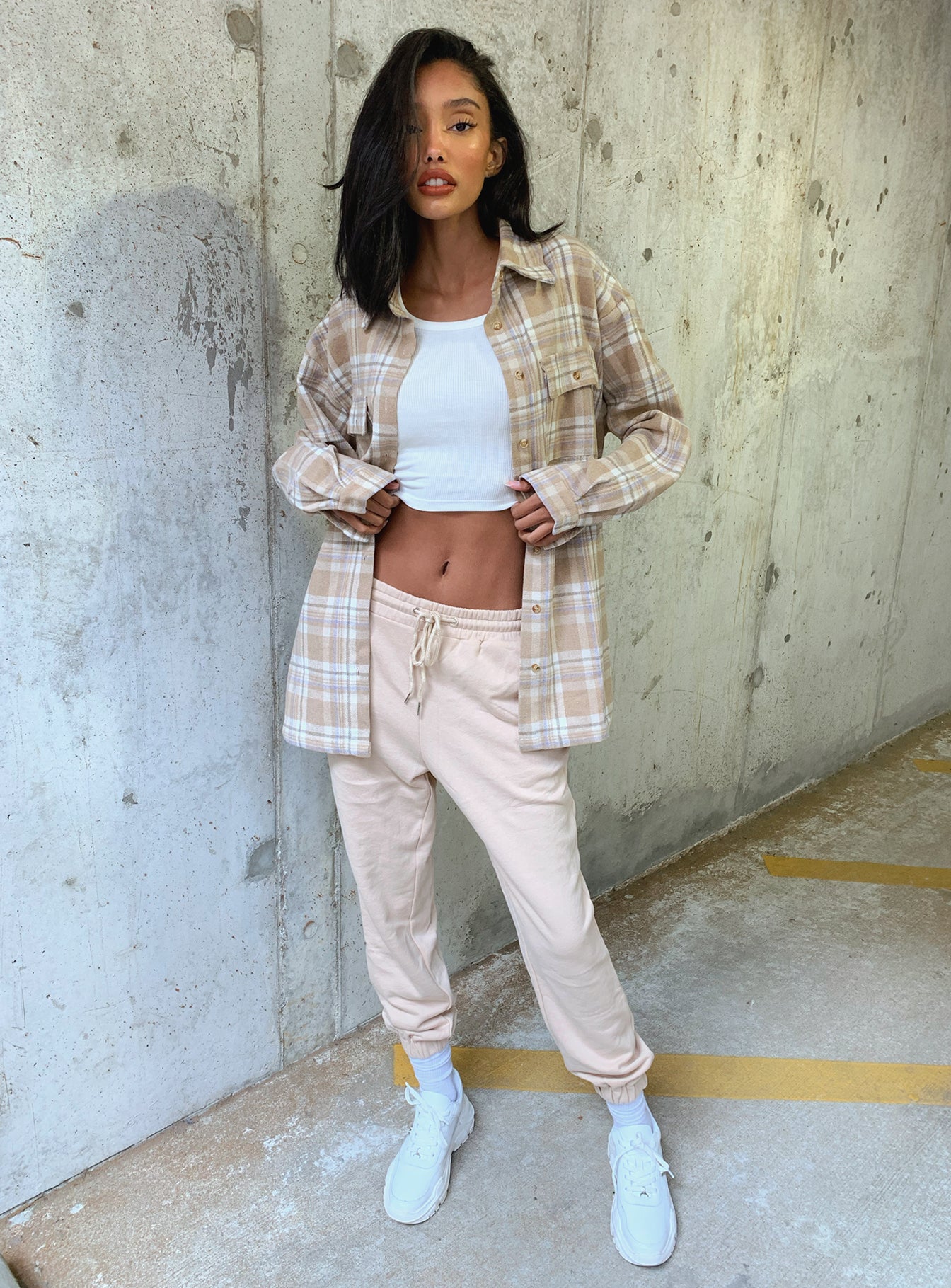 front view of model wearing Princess Polly Nero Sweat Pants Beige 