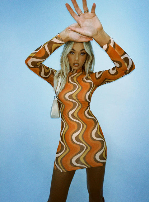 Front view of model wearing  front Princess Polly Asymmetric Neckline  Orion Long Sleeve Mini Dress Orange Multi