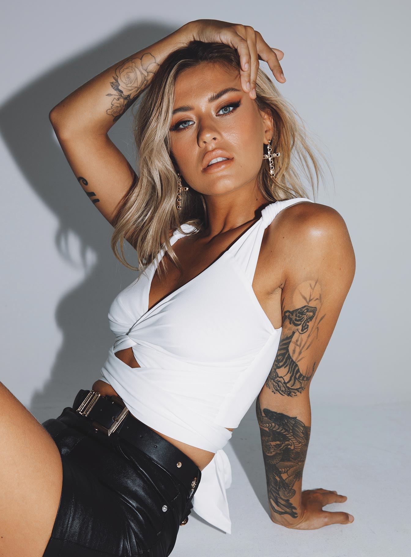 back view of model wearing Princess Polly Porto Cervo Tie Up Crop White 