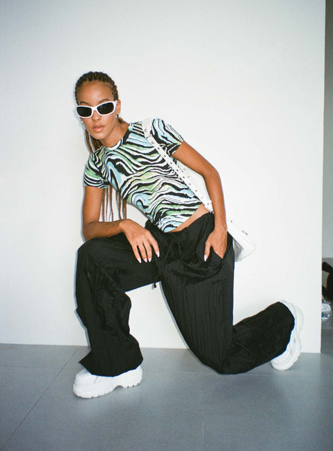 front view of model wearing Princess Polly Motel Surtie Top Warped Zebra Blue Short Sleeves Crew Neck 