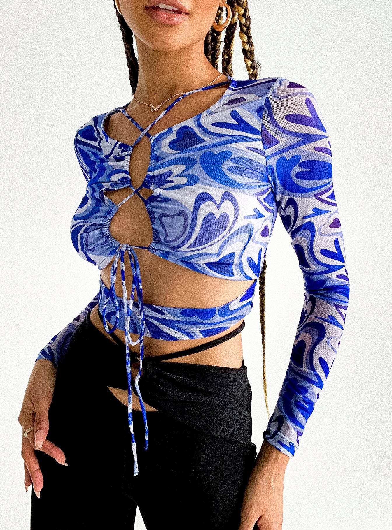 back view of model wearing Princess Polly Saunders Long Sleeve Top Blue 