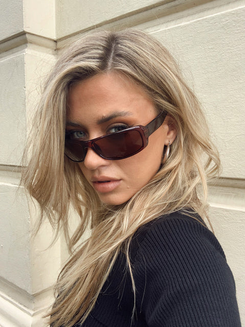 Sunglasses  Princess Polly Exclusive 100% polycarbonate Hero Image: Cathlin UV 400 Brown tinted lenses  Moulded nose bridge