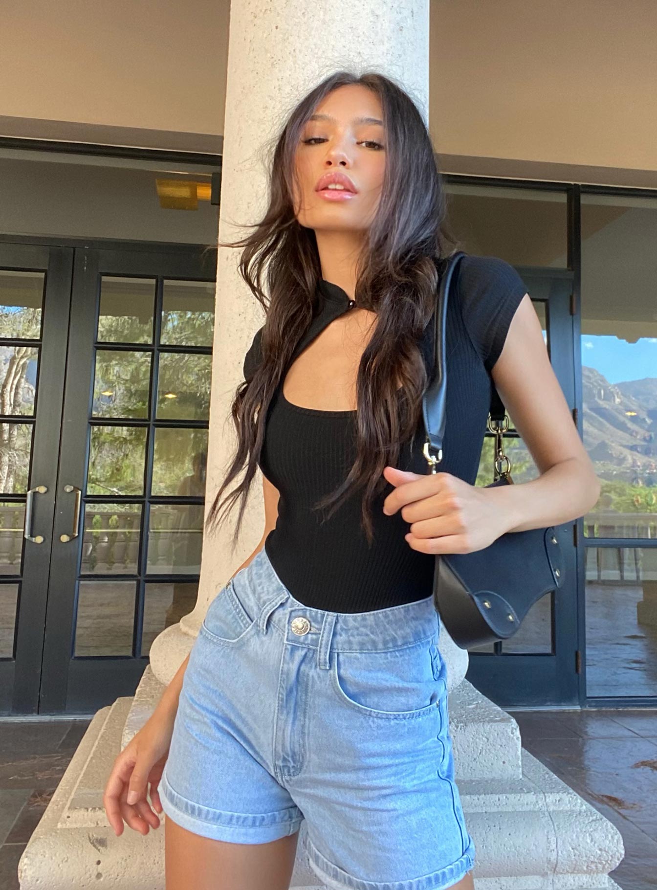 side view of model wearing Princess Polly Wild Times Bodysuit Short Sleeves High Neck 