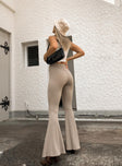 back view of model wearing Princess Polly Rita Roberts Flares 