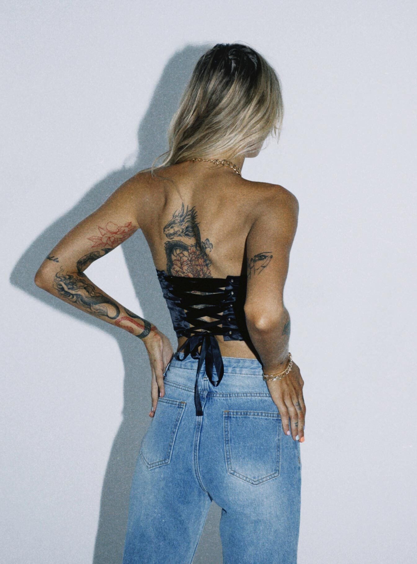 back view of model wearing Princess Polly Maya Corset Top Black 