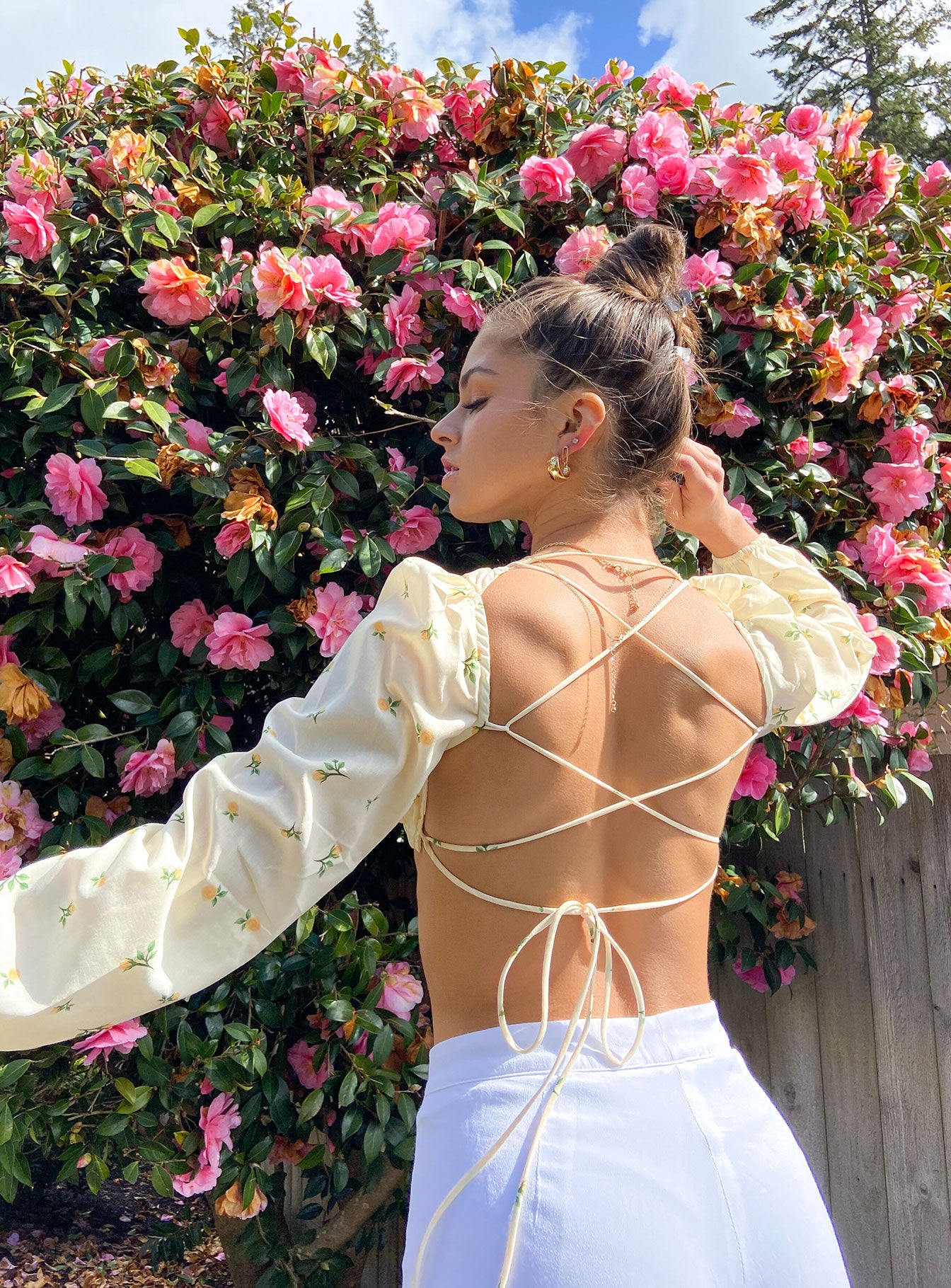 side view of model wearing Princess Polly Violetta Top Yellow 